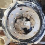 saniflo blocked by Jantex Kitchen Rolls paper, Approved Saniflo Engineer repairing a Saniflo macerator